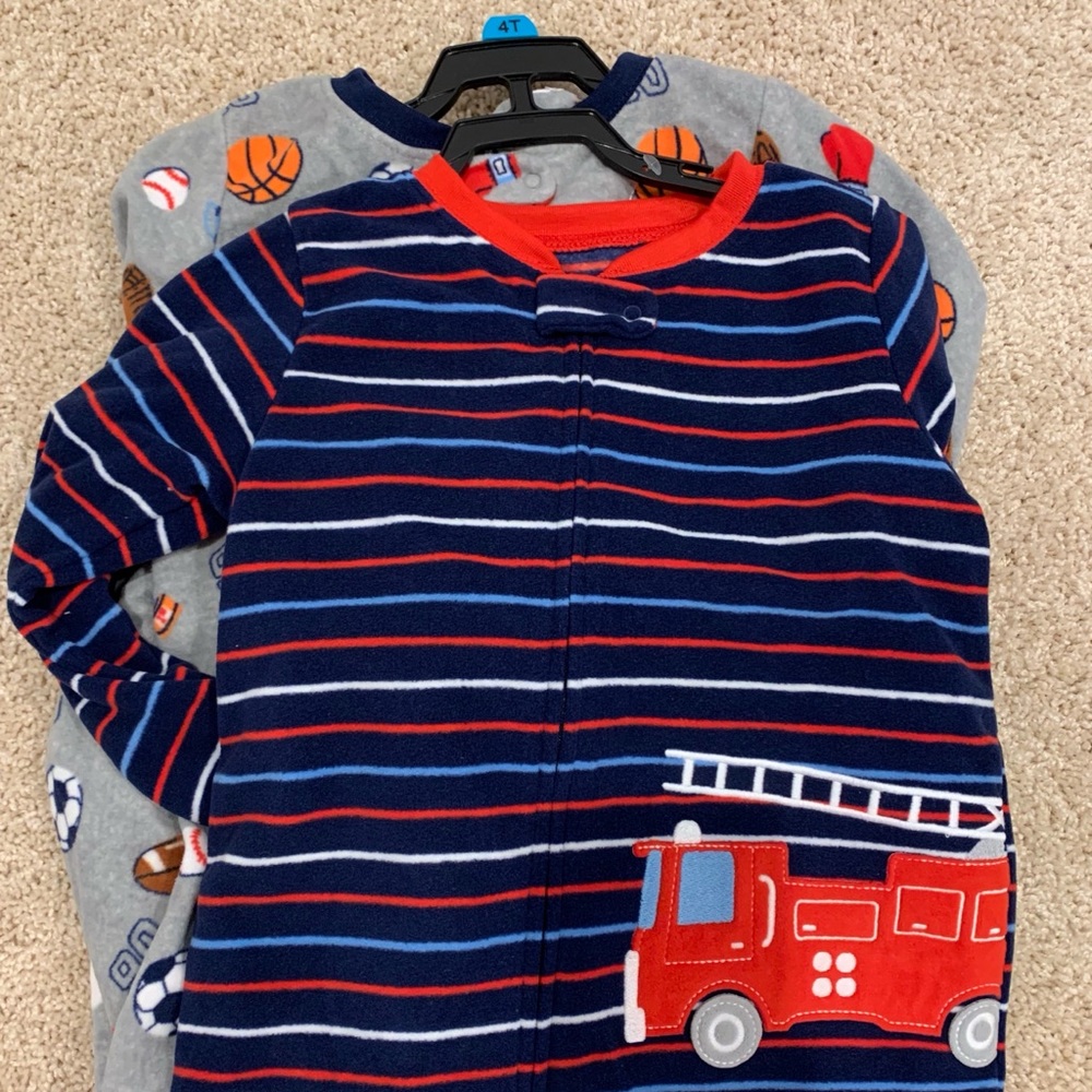 NWT set of two Carters Footie fleece pajamas